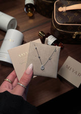 COLLIER GINA