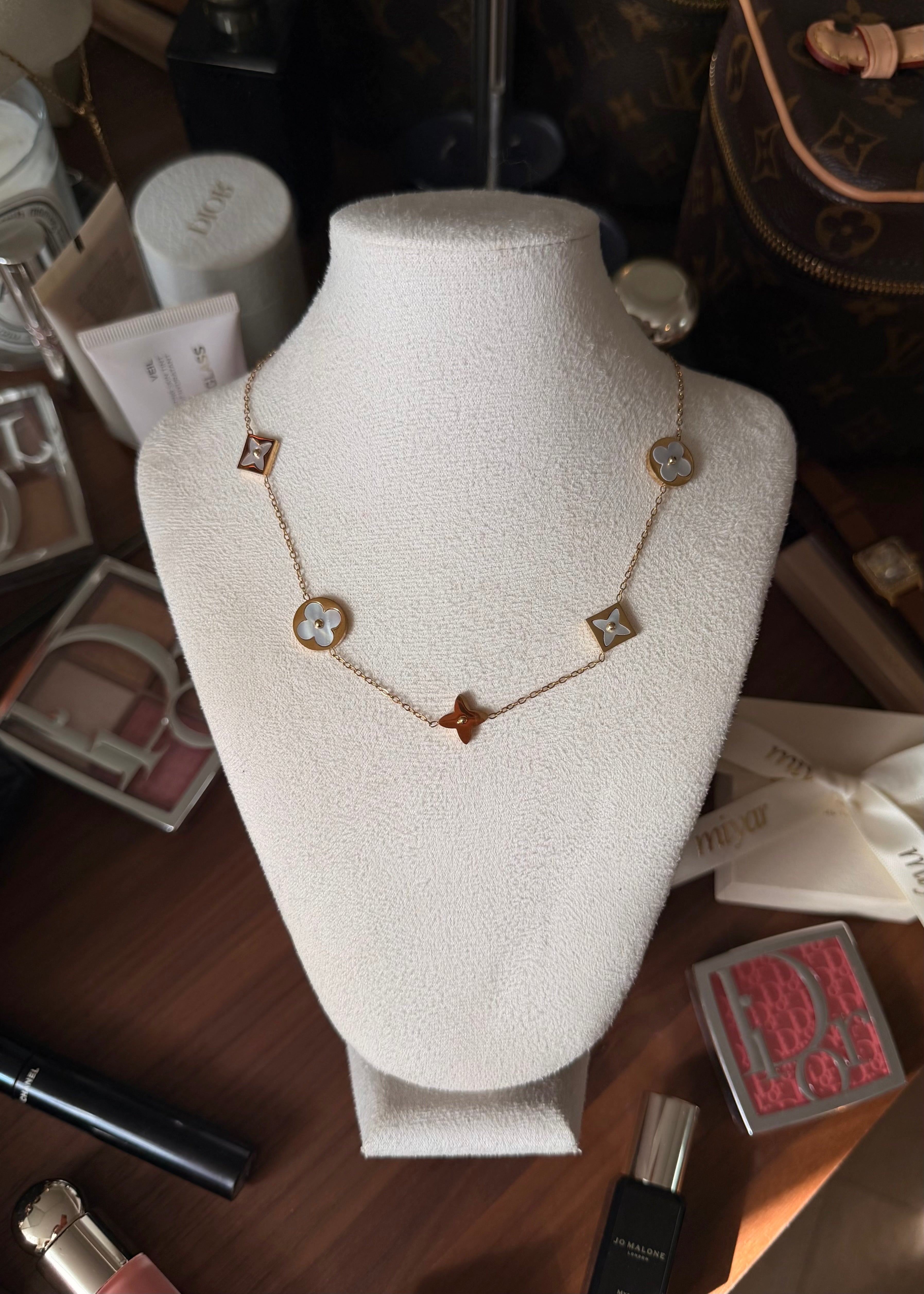 COLLIER LOUISE